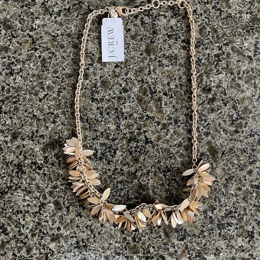 NWT, JCREW Gold necklace with gold metal almond shape clusters.